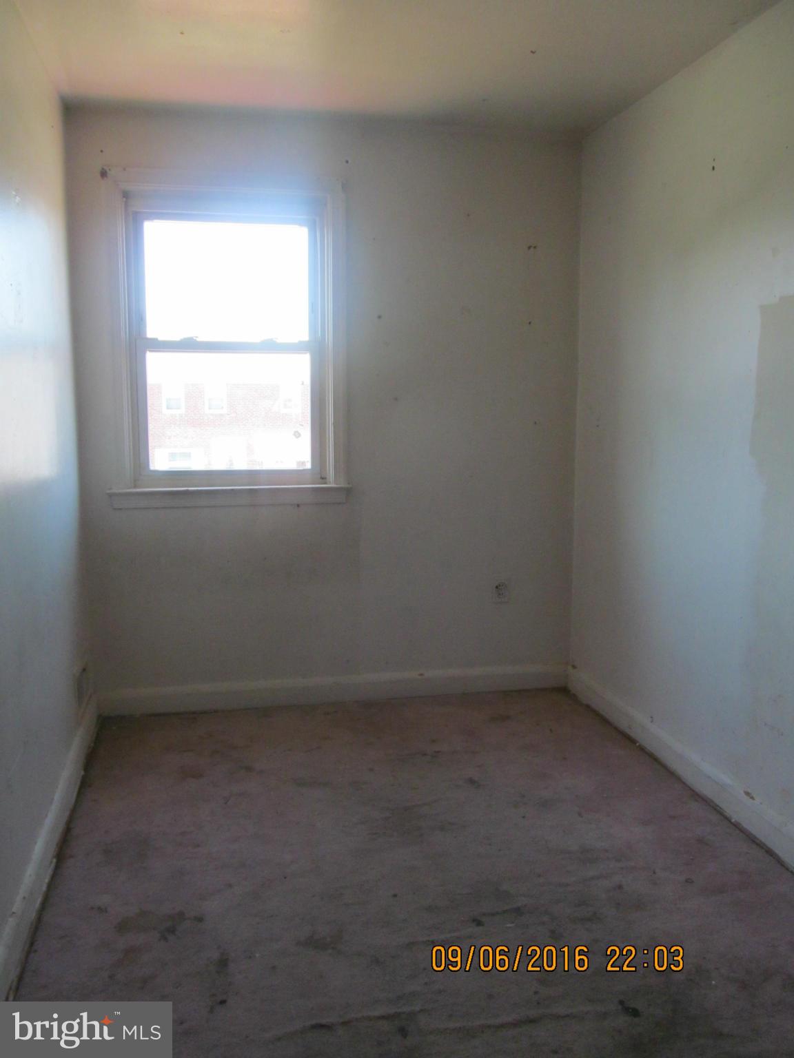 2106 Redthorn Road Baltimore, MD 21220 - Photo 10 of 13 an empty room with a window