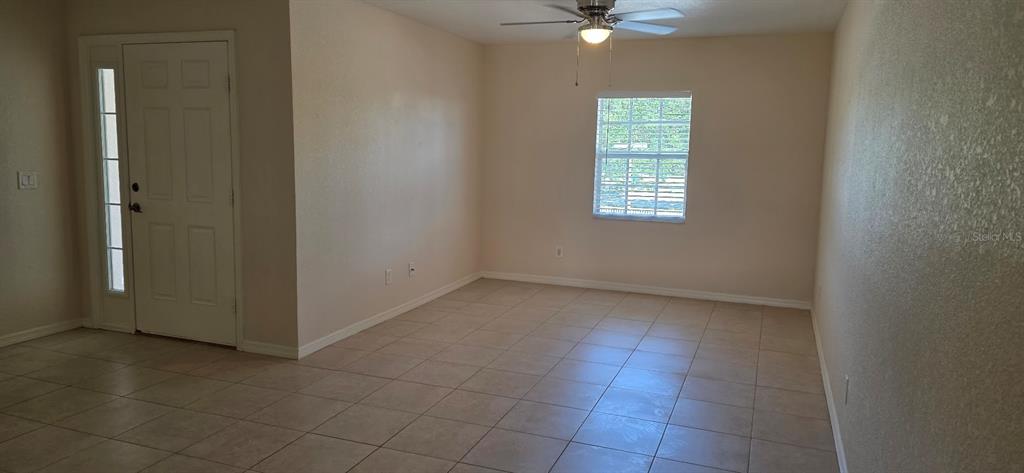 26201 Explorer Road, Unit 5 Punta Gorda, FL 33983 - Photo 3 of 11 an empty room with a window