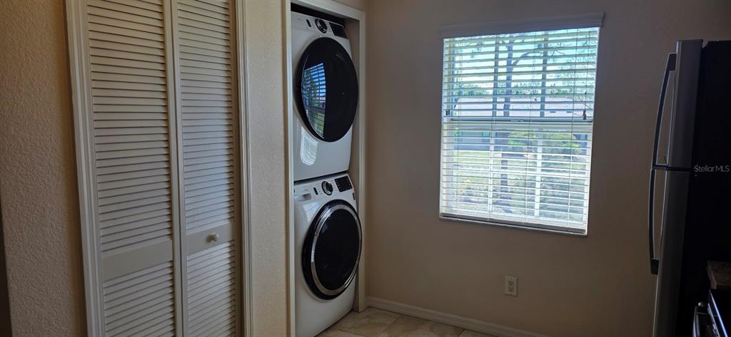 26201 Explorer Road, Unit 5 Punta Gorda, FL 33983 - Photo 6 of 11 a utility room with dryer and washer