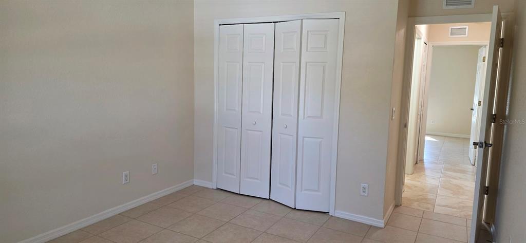 26201 Explorer Road, Unit 5 Punta Gorda, FL 33983 - Photo 9 of 11 a view of a closet area