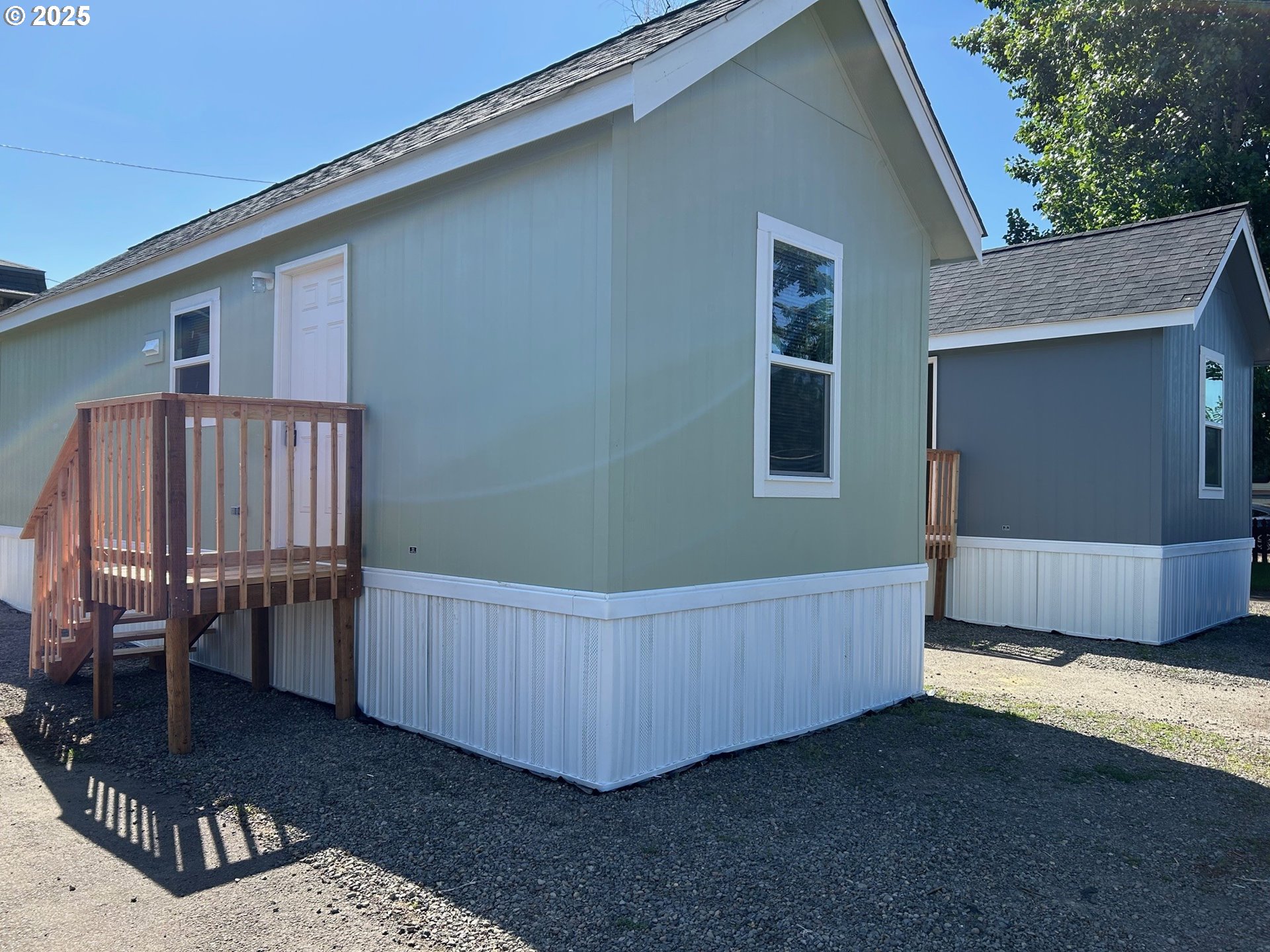 a view of a backyard with furniture