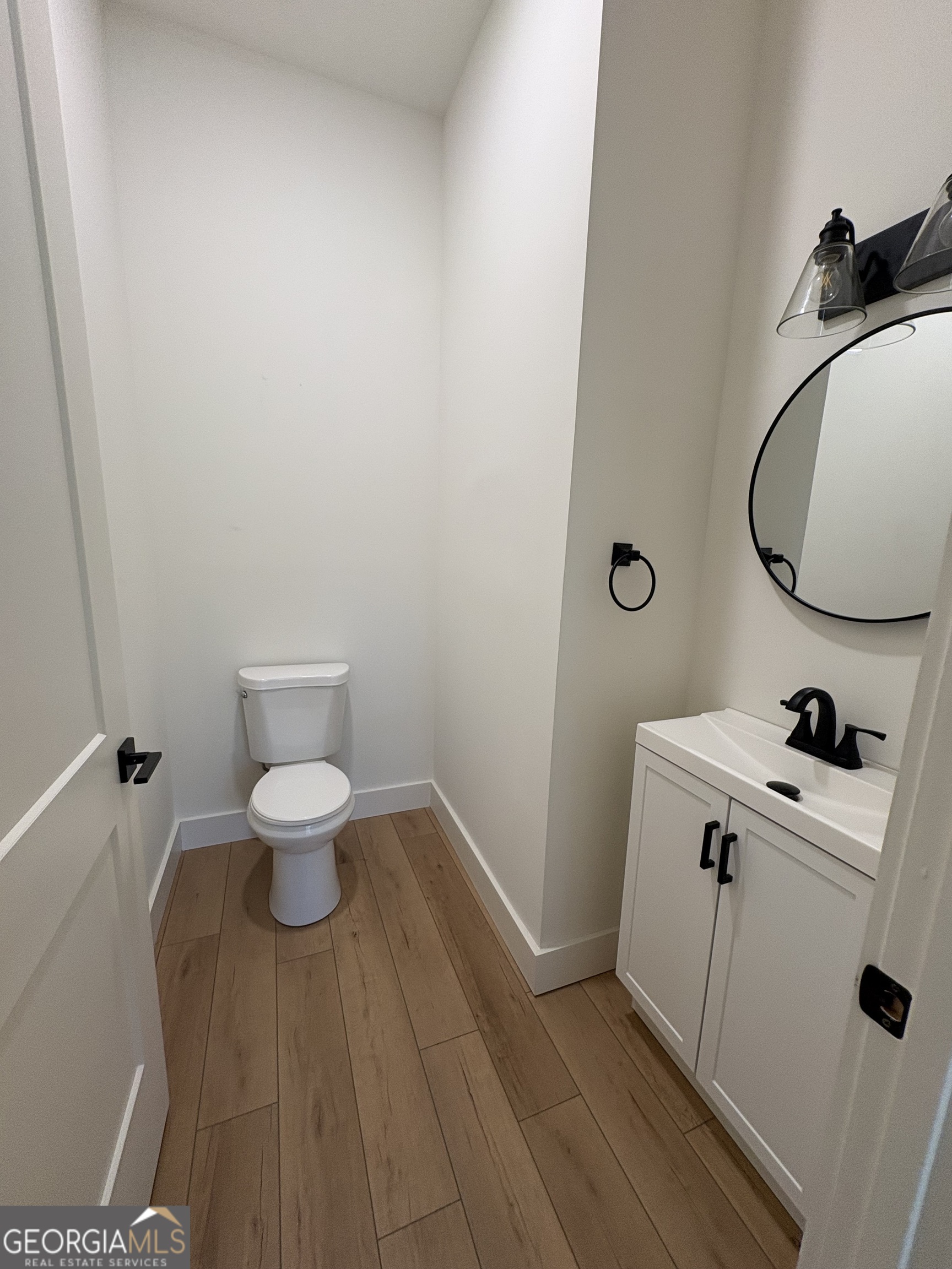 435 Muskogee Trail Dublin, GA 31021 - Photo 20 of 31 a bathroom with a sink and a toilet