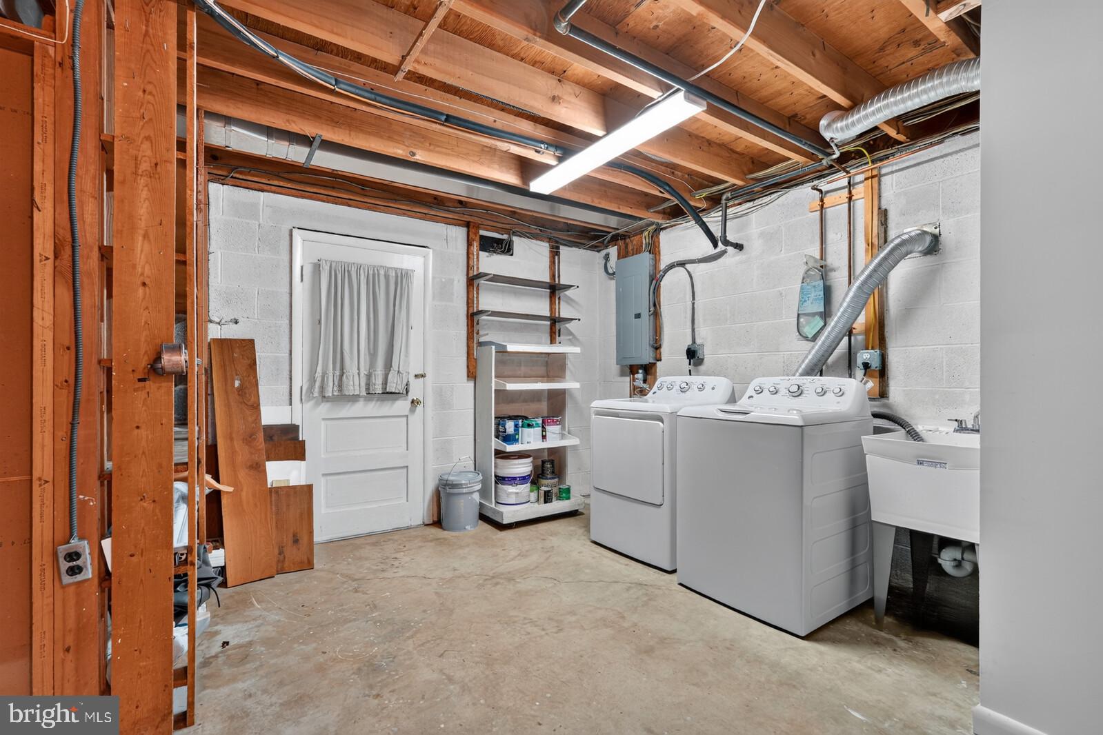204 Rolling Road Gaithersburg, MD 20877 - Photo 31 of 53 Utility/laundry/storage room has outside access