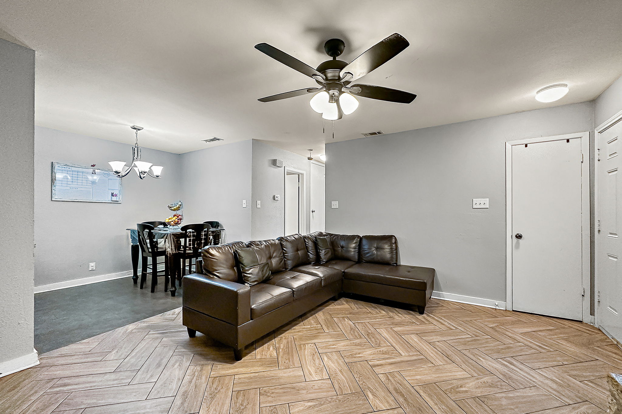 700 Misty Morning Way Round Rock, TX 78664 - Photo 23 of 36 Unit A - Living space leading to the dining area and kitchen.