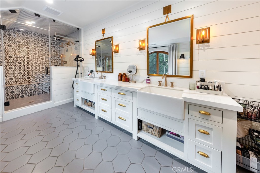 85 Saddlebow Road Bell Canyon, CA 91307 - Photo 44 of 75 a bathroom with a double vanity sink mirror and double