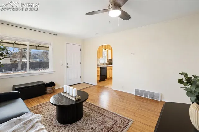 a living room with furniture and a window