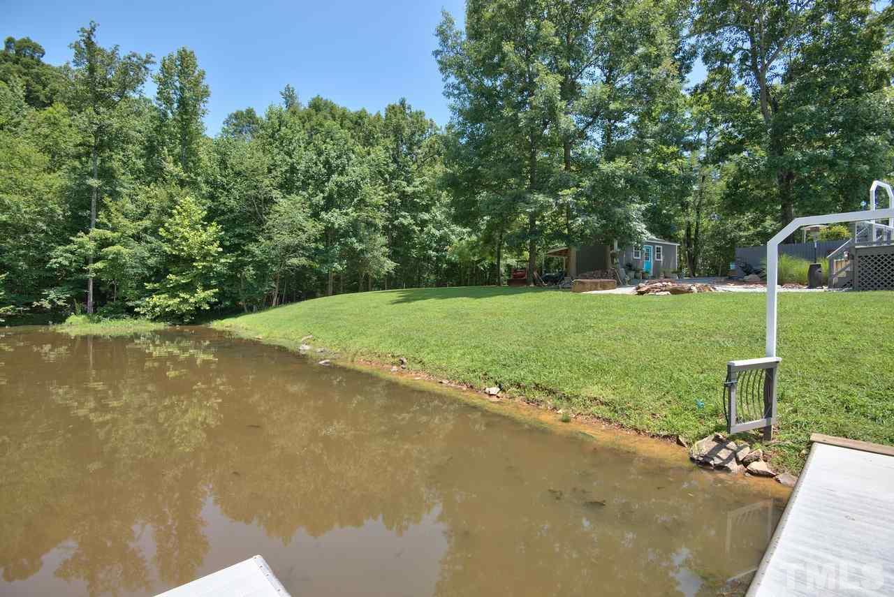 718 Patrick Road Bahama, NC 27503 - Photo 22 of 25 a view of a backyard