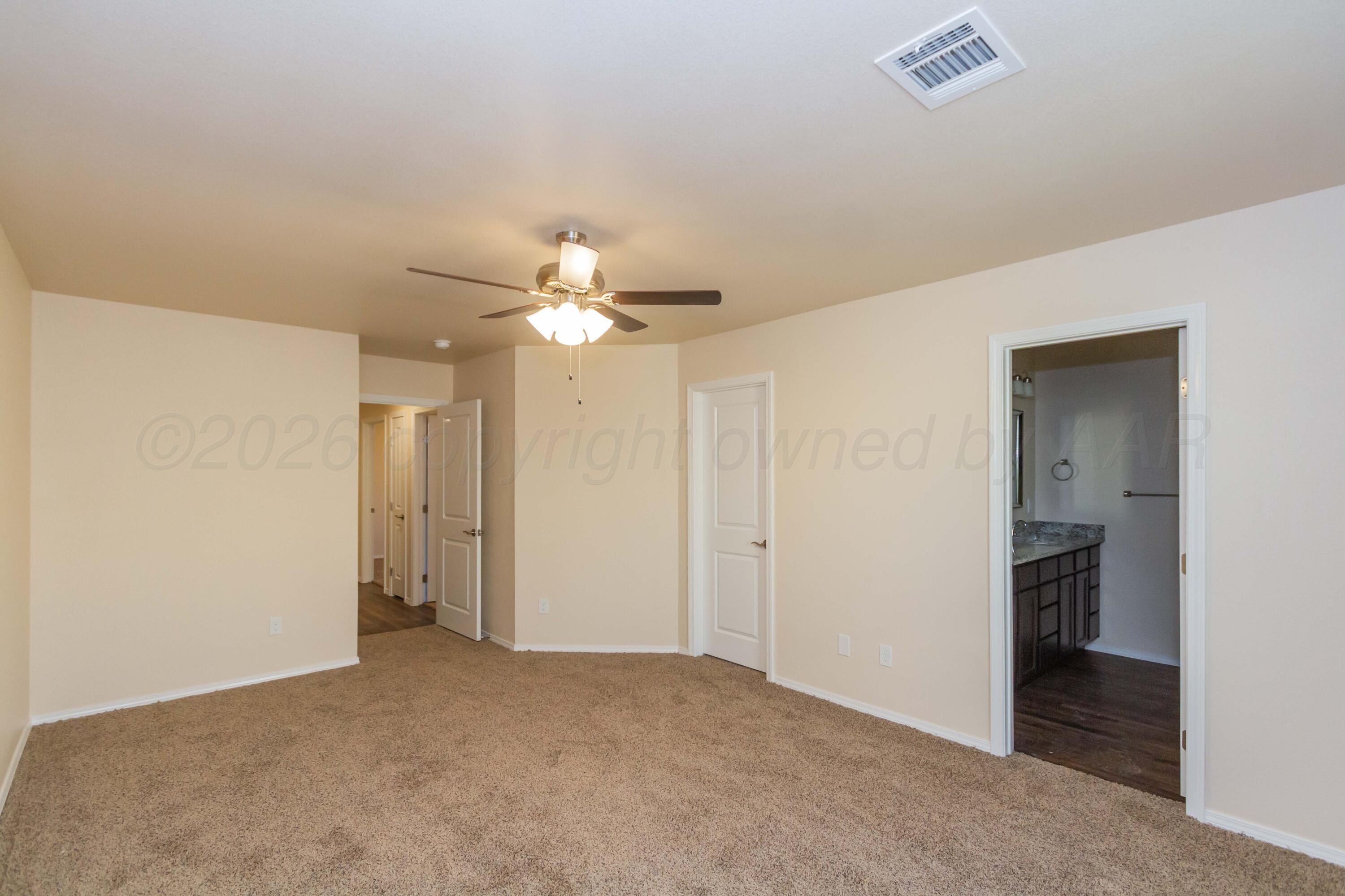 4303 Sunset Street Amarillo, TX 79118 - Photo 11 of 27 STOCK PHOPRIMARY BEDROOM