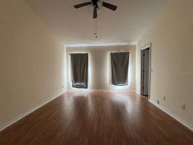 a view of an empty room with window