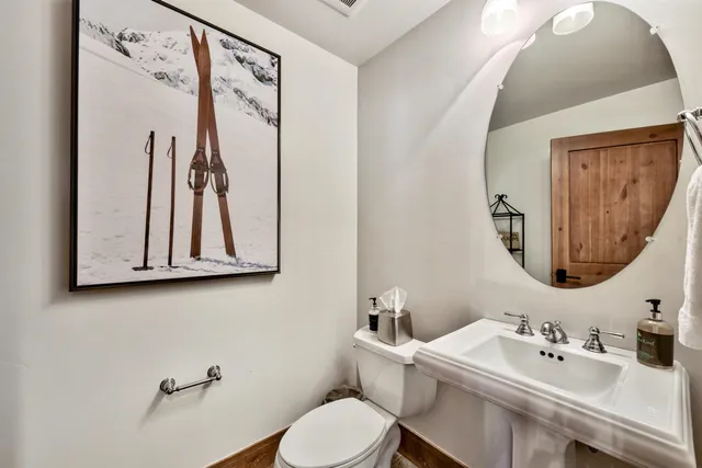 a view of a house with backyard porch and sitting area