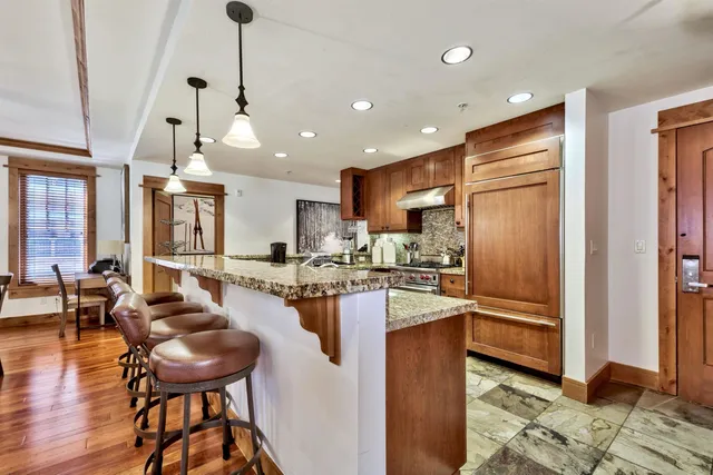 a front view of a building with glass windows