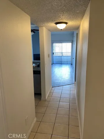 a view of hallway with a white walls