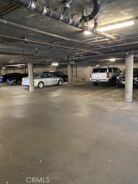 440 West 5th Street, Unit 305 Long Beach, CA 90802 - Photo 20 of 20 a view of parking garage with cars