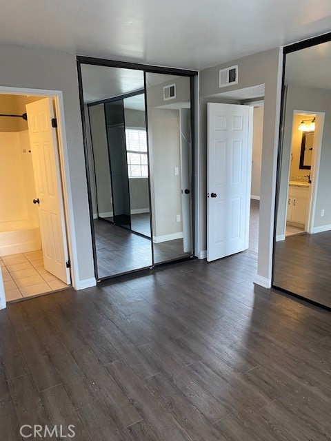 440 West 5th Street, Unit 305 Long Beach, CA 90802 - Photo 6 of 20 a view of a hallway with wooden floor