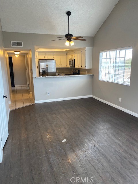 440 West 5th Street, Unit 305 Long Beach, CA 90802 - Photo 7 of 20 wooden floor in an empty room with a window