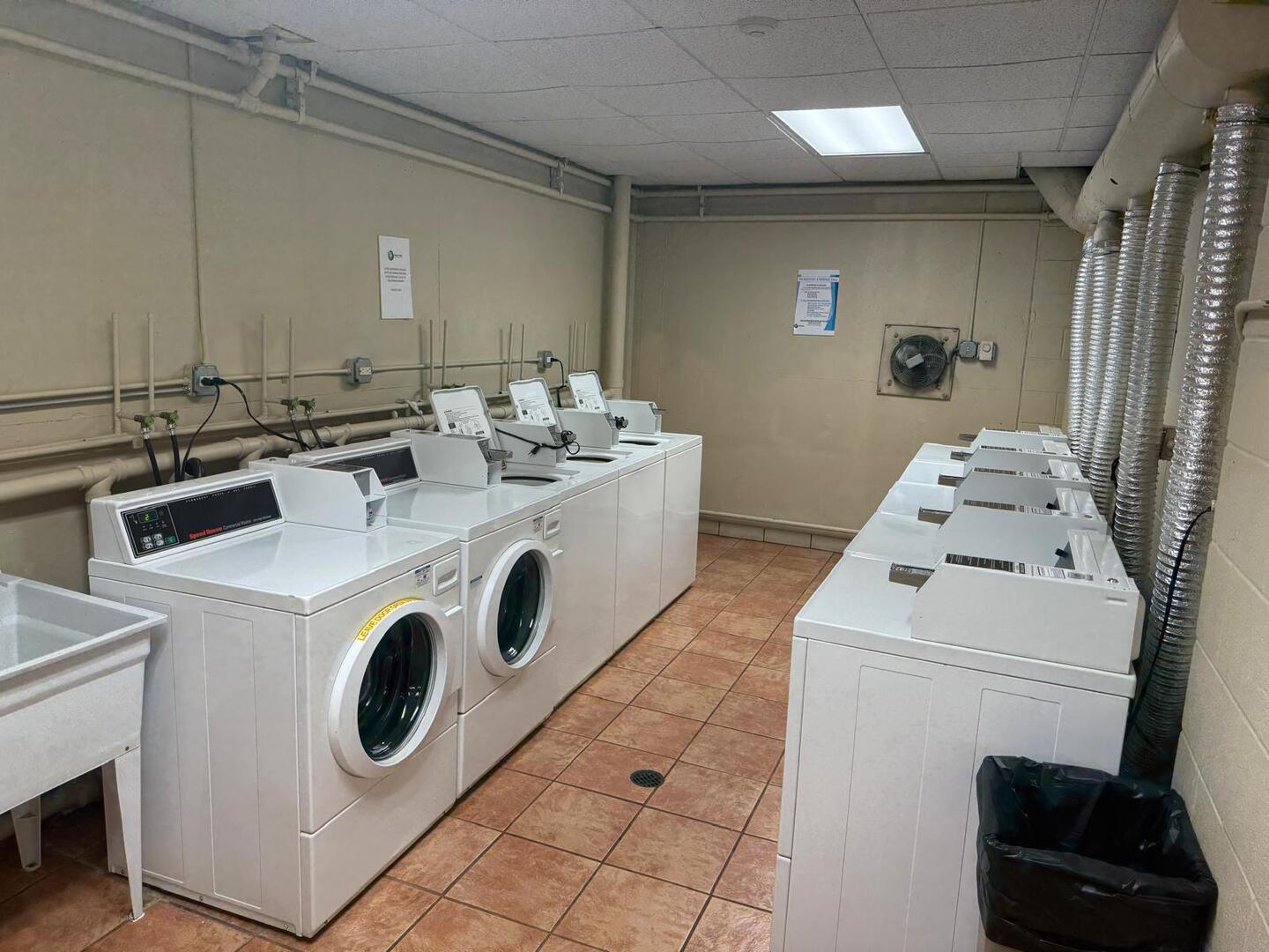 1043 South York Road, Unit 411 Bensenville, IL 60106 - Photo 27 of 31 a utility room with dryer and washer