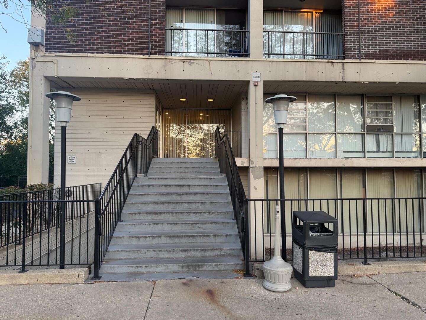 1043 South York Road, Unit 411 Bensenville, IL 60106 - Photo 3 of 31 a view of a house with a balcony