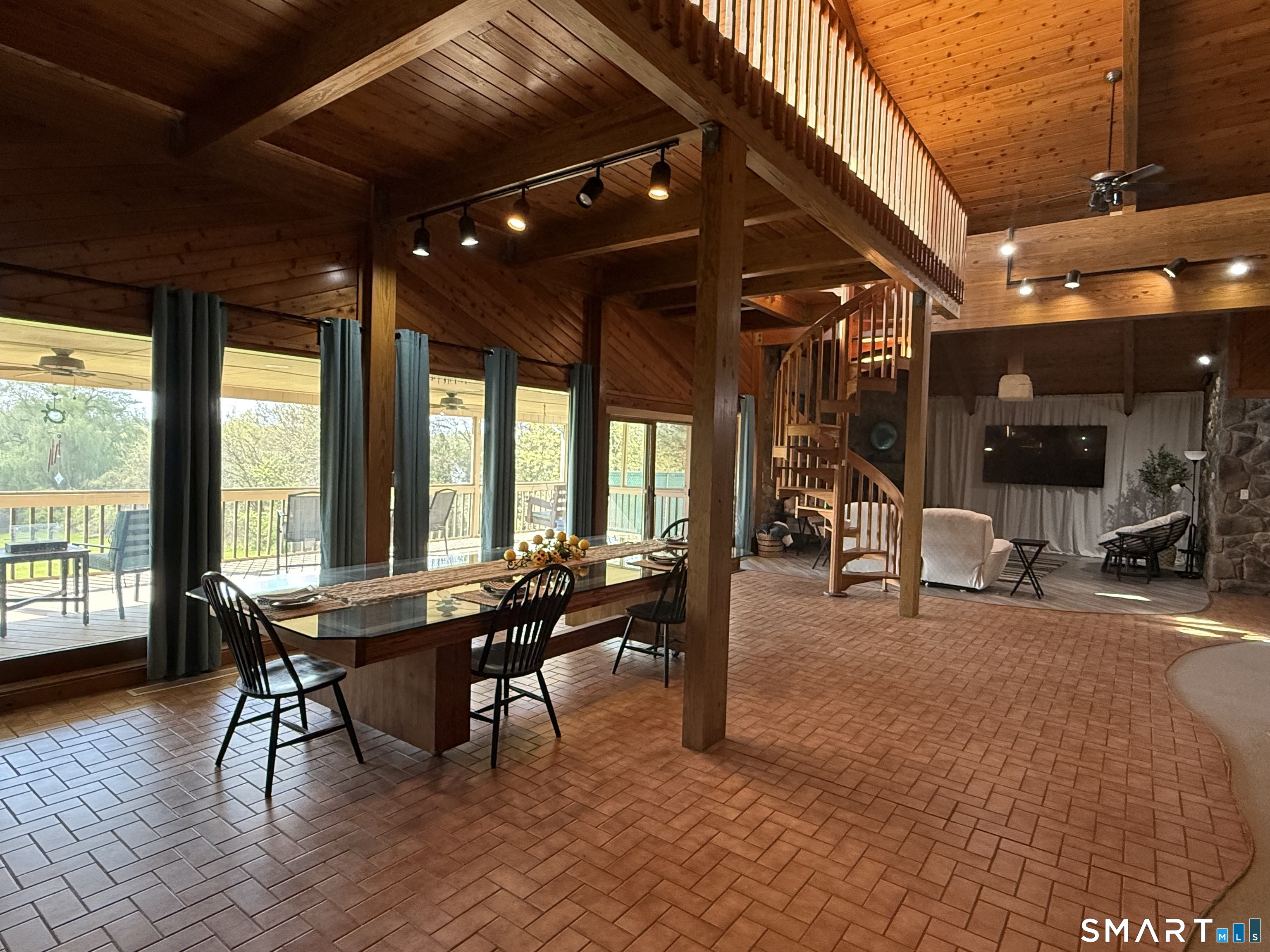 7 Riverview Street Enfield, CT 06082 - Photo 17 of 29 a patio with yard glass top table and chairs