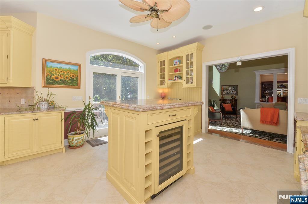 14 Werimus Brook Road Saddle River, NJ 07458 - Photo 15 of 50 a view of livingroom with furniture and a chandelier