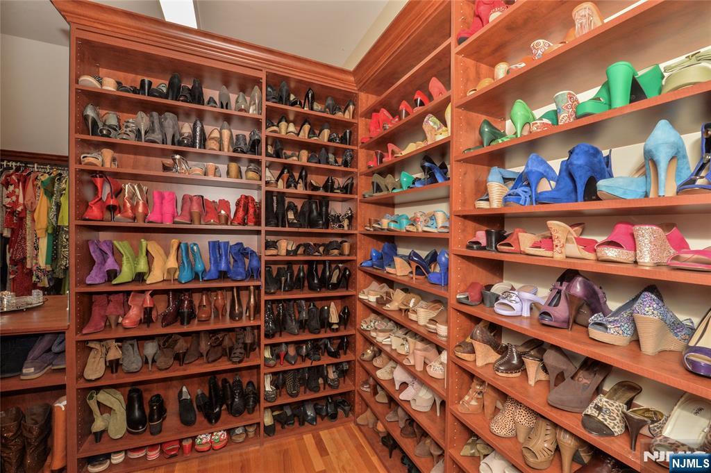 14 Werimus Brook Road Saddle River, NJ 07458 - Photo 38 of 50 a view of a book shelf with lots of books