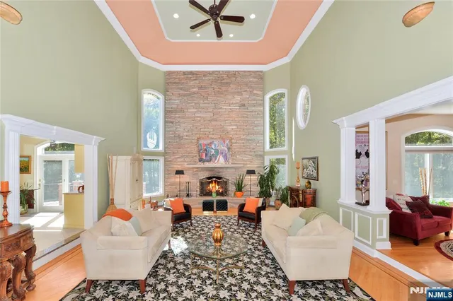 a living room with furniture and a rug