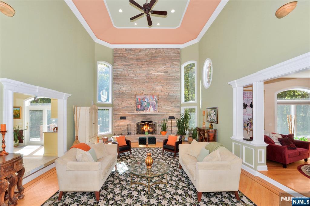 14 Werimus Brook Road Saddle River, NJ 07458 - Photo 10 of 50 a living room with furniture and a rug