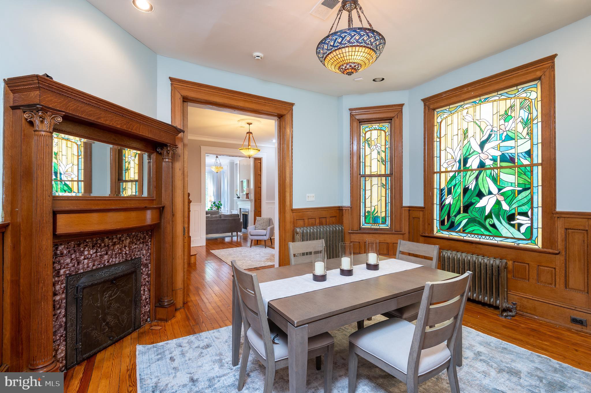721 A Street Southeast Washington, DC 20003 - Photo 13 of 46 Dining room with custom stained glass