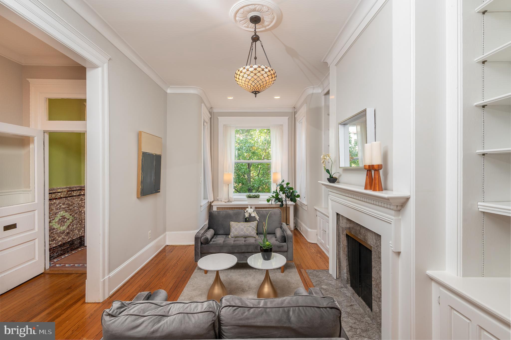 721 A Street Southeast Washington, DC 20003 - Photo 4 of 46 Living room with working fireplace