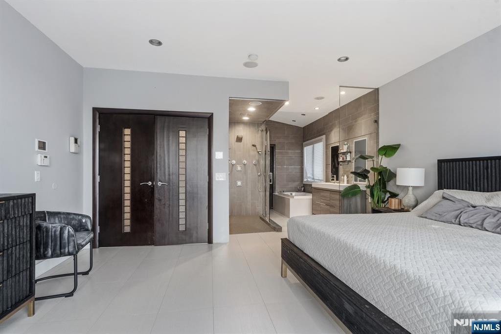 760 Undercliff Avenue, Unit B Edgewater, NJ 07020 - Photo 31 of 49 a bedroom with bed and window