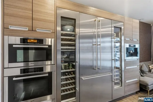 a kitchen with a stove and cabinets