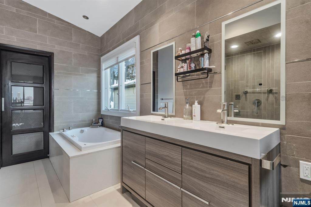 760 Undercliff Avenue, Unit B Edgewater, NJ 07020 - Photo 48 of 49 a bathroom with a sink double vanity