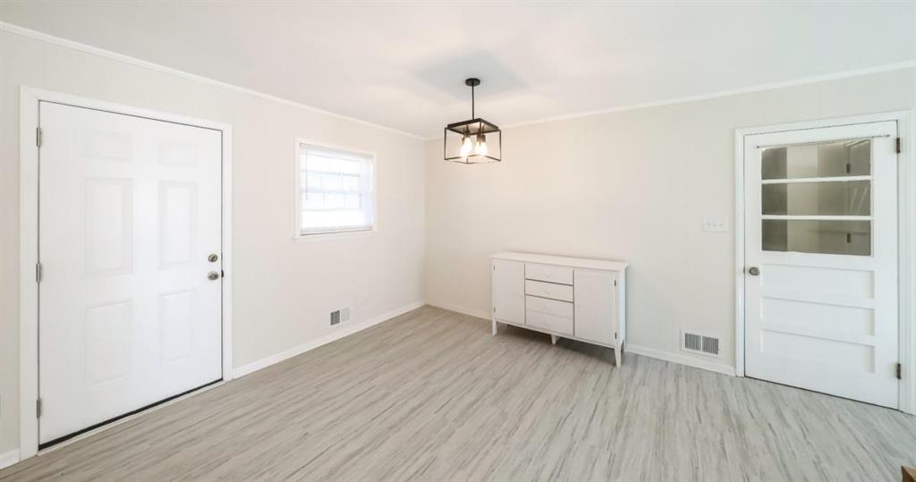 4045 Compton Circle Powder Springs, GA 30127 - Photo 11 of 54 wooden floor in an empty room with a window