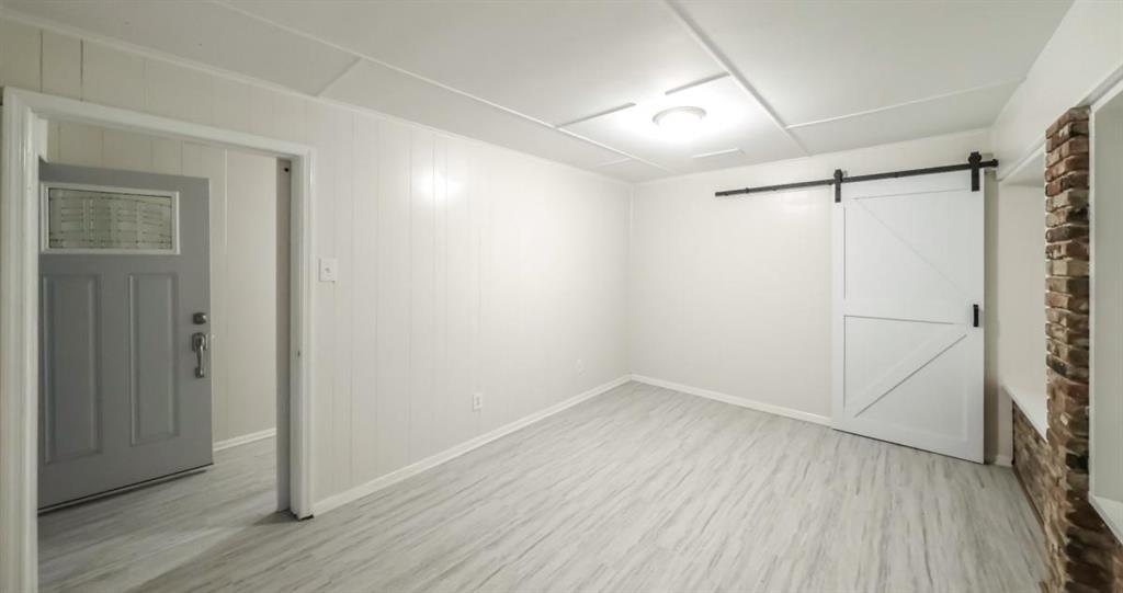 4045 Compton Circle Powder Springs, GA 30127 - Photo 14 of 54 a view of a room with wooden floor and white walls