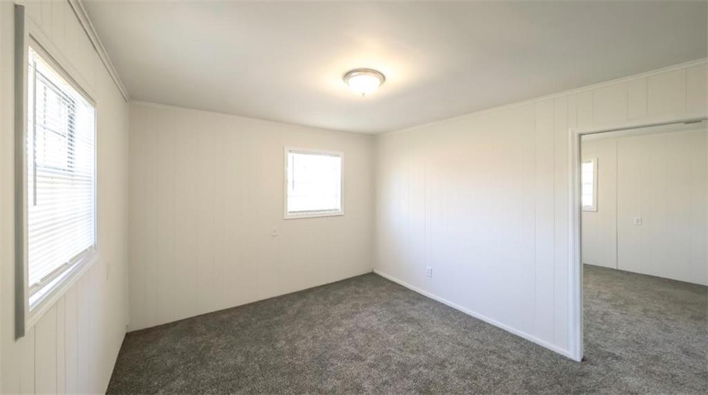 4045 Compton Circle Powder Springs, GA 30127 - Photo 26 of 54 an empty room with windows