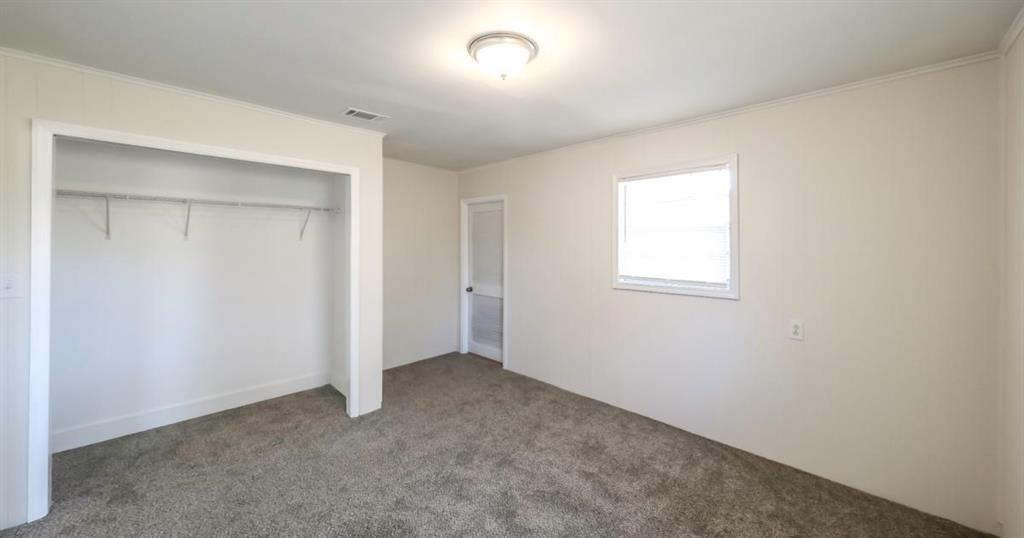 4045 Compton Circle Powder Springs, GA 30127 - Photo 27 of 54 an empty room with a natural light