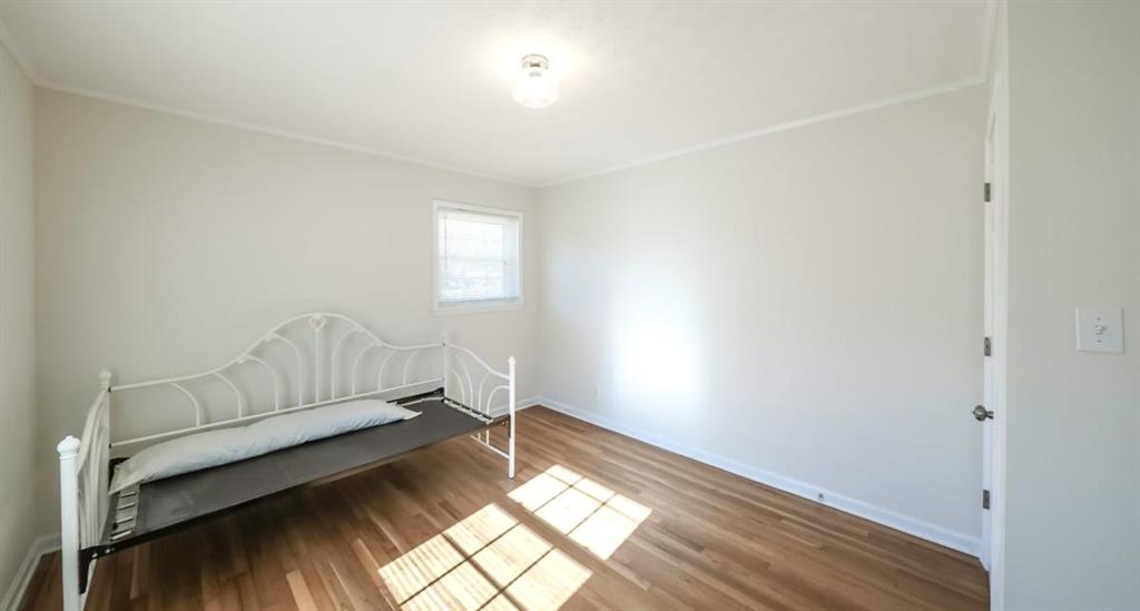4045 Compton Circle Powder Springs, GA 30127 - Photo 30 of 54 wooden floor in an empty room with a window