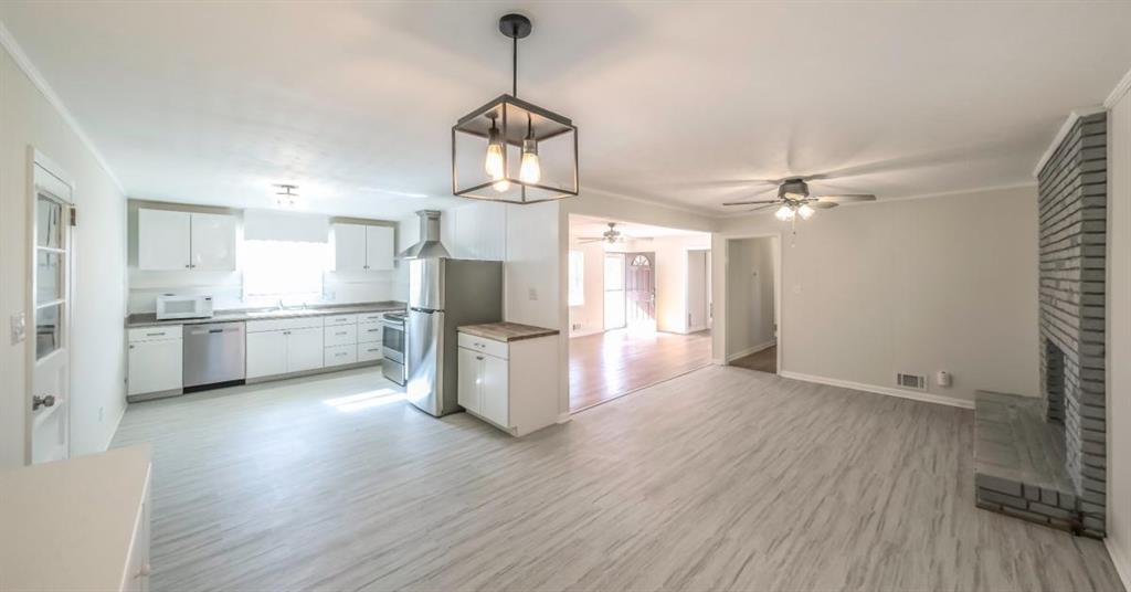 4045 Compton Circle Powder Springs, GA 30127 - Photo 38 of 54 a view of a kitchen with sink microwave and cabinets
