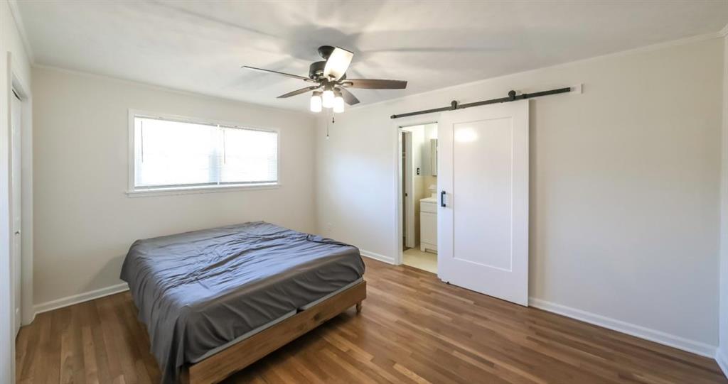 4045 Compton Circle Powder Springs, GA 30127 - Photo 50 of 54 a bedroom with a bed and a window