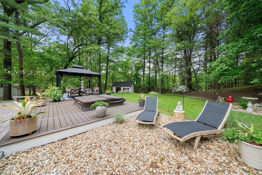 12 Nancy Road Natick, MA 01760 - Photo 24 of 25 a view of a patio with chairs and a table