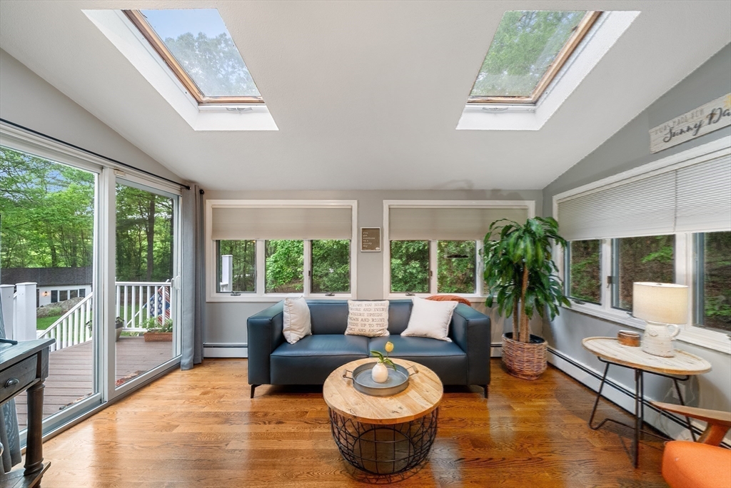 12 Nancy Road Natick, MA 01760 - Photo 7 of 25 a living room with furniture and a large window
