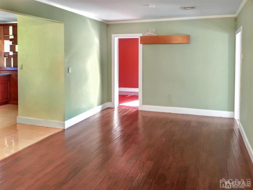 122 South Lincoln Avenue Middlesex, NJ 08846 - Photo 21 of 37 a view of a room with wooden floor