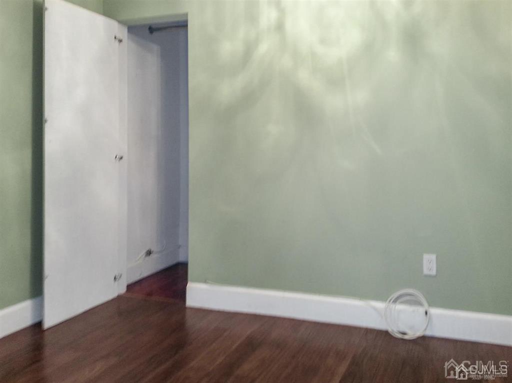 122 South Lincoln Avenue Middlesex, NJ 08846 - Photo 27 of 37 a view of small space with wooden floor