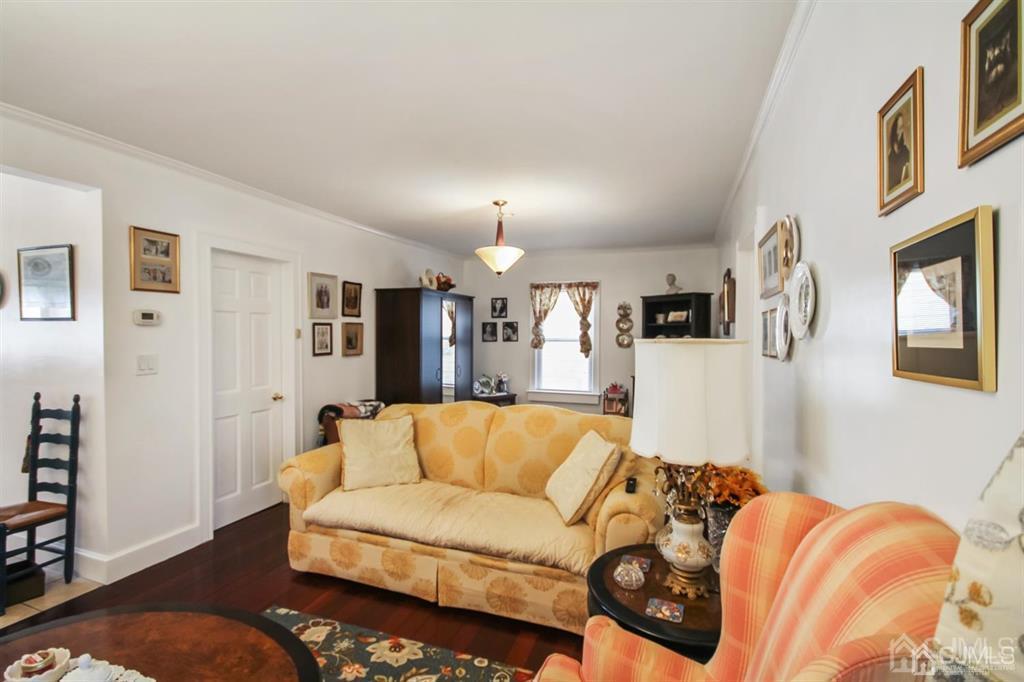 122 South Lincoln Avenue Middlesex, NJ 08846 - Photo 3 of 37 a living room with furniture and a couch