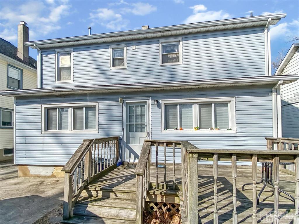 122 South Lincoln Avenue Middlesex, NJ 08846 - Photo 34 of 37 a front view of a house with many windows