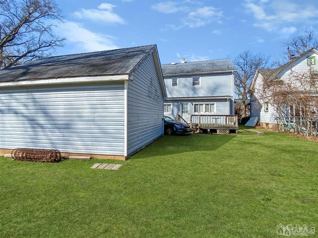 122 South Lincoln Avenue Middlesex, NJ 08846 - Photo 35 of 37 a view of a house with a backyard