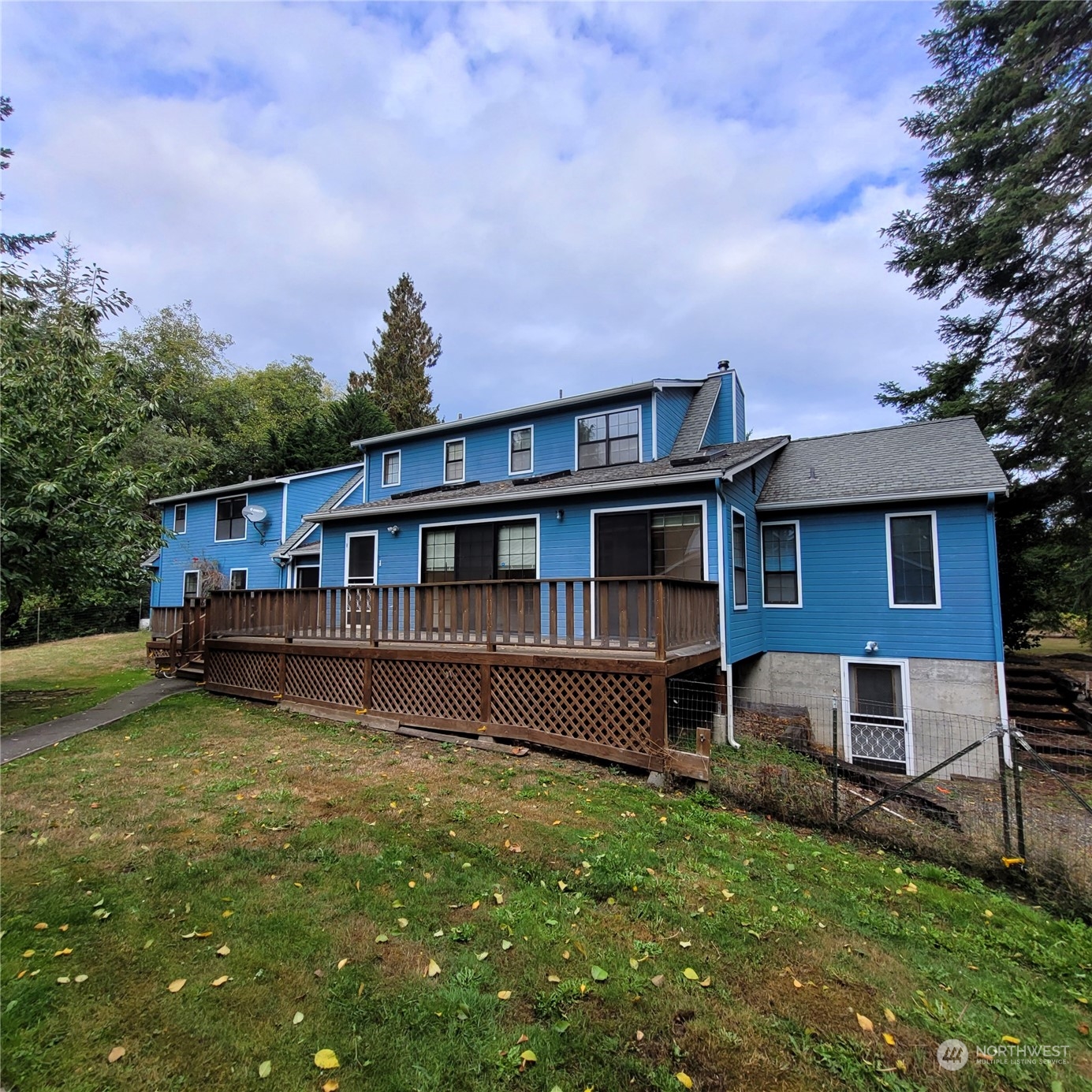 2712 Atterberry Road Sequim, WA 98382 - Photo 33 of 39 a view of a house with a yard balcony and sitting area