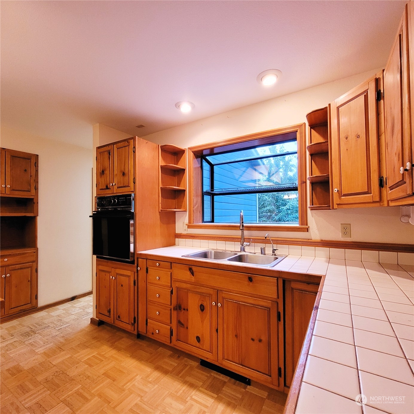 2712 Atterberry Road Sequim, WA 98382 - Photo 8 of 39 a kitchen with stainless steel appliances a sink and cabinets