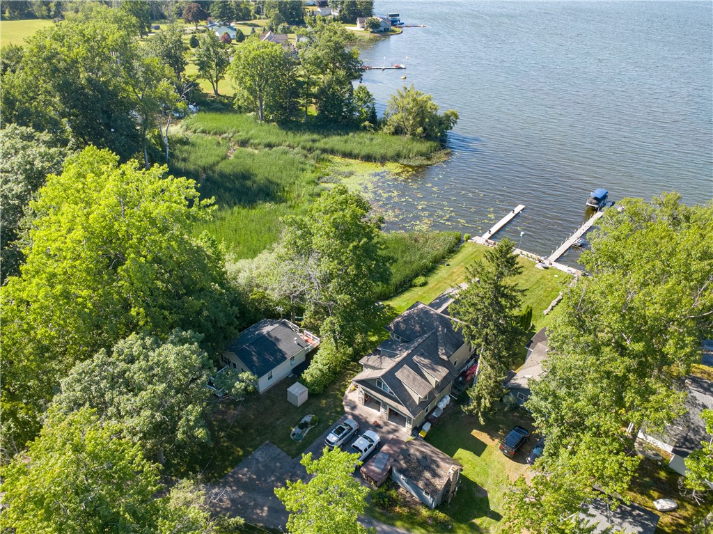 6925 Emerald Point Road Sodus, NY 14555 - Photo 29 of 32 Here’s a view of the yard- there’s even a kayak la