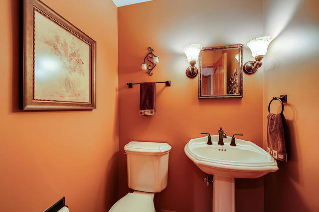 125 Briargate Road Cary, IL 60013 - Photo 11 of 24 a bathroom with a toilet sink and mirror