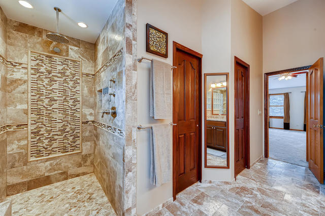 125 Briargate Road Cary, IL 60013 - Photo 13 of 24 a bathroom with a shower and a sink